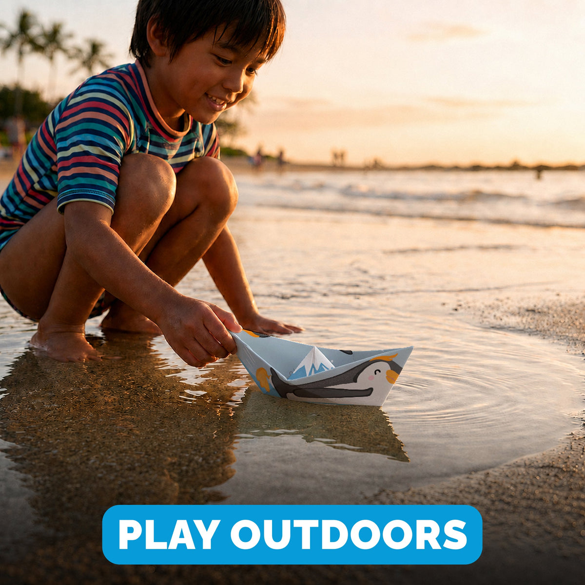 Child playing with a WOYS North paper boat outdoors